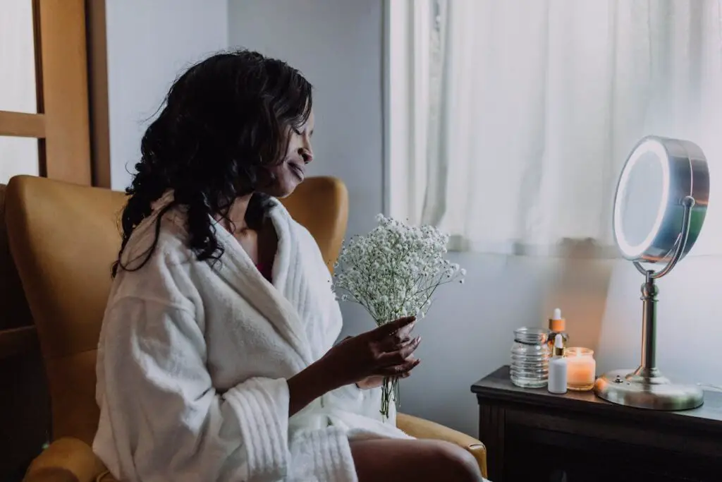 Photo by RDNE Stock project: https://www.pexels.com/photo/a-woman-wearing-white-robe-holding-a-bunch-of-baby-s-breath-flowers-6724541/